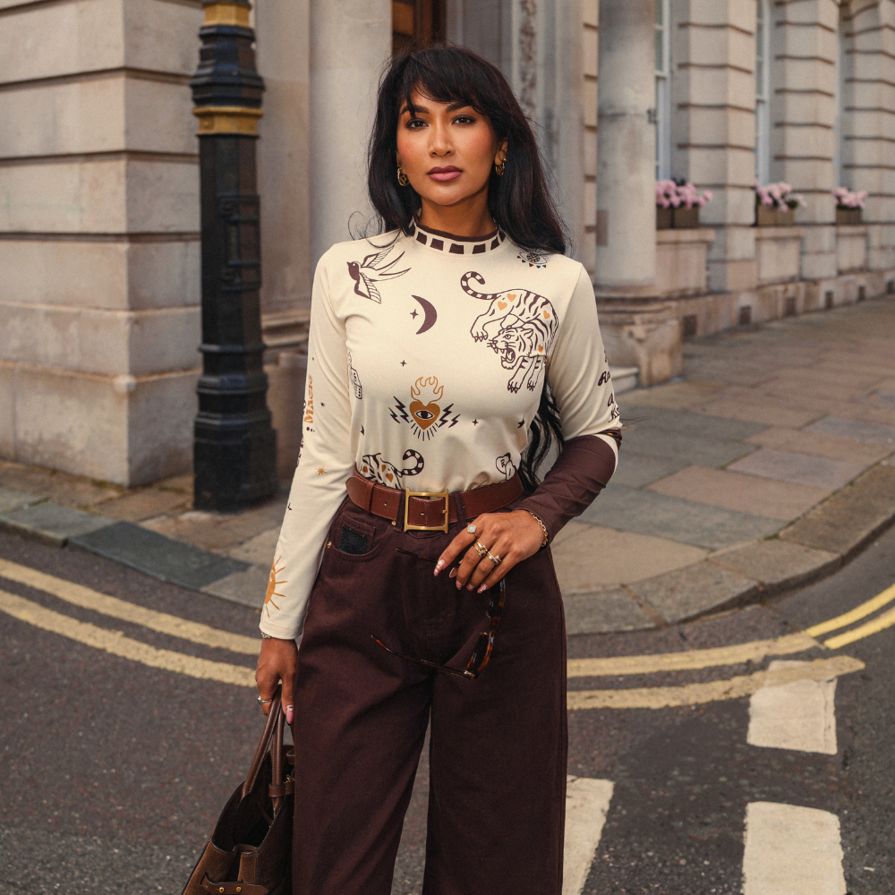 Wildust Sisters Moonchild thermal Lycra top in ecru with tattoo-inspired graphics