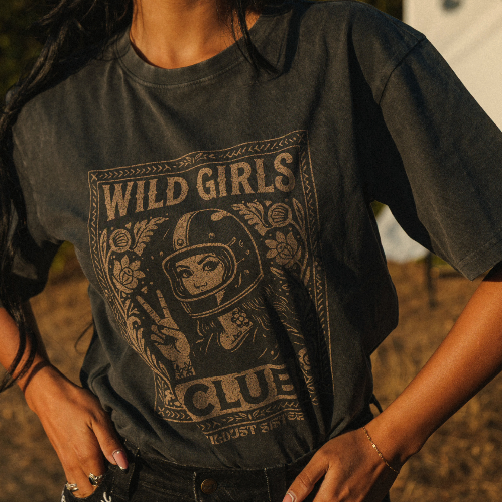 Wildust Sisters Wild Girls Club T-shirt in washed black with a beige front graphic