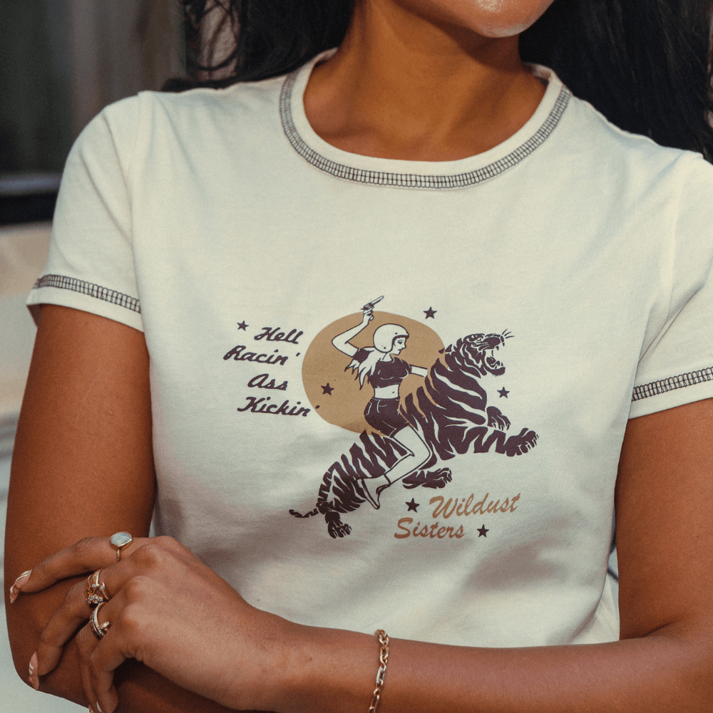 Wildust Sisters Hell Racin' cropped cotton T-shirt with a woman riding a tiger graphic