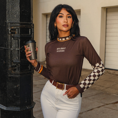 Wildust Sisters Racing Club thermal Lycra top with vintage racing graphics