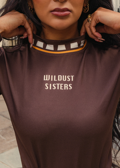 Wildust Sisters Racing Club thermal Lycra top with vintage racing graphics