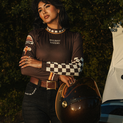 Wildust Sisters Racing Club thermal Lycra top with vintage racing graphics