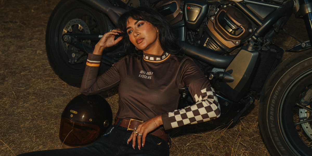 Wildust Sisters Racing Club thermal Lycra top with vintage racing graphics