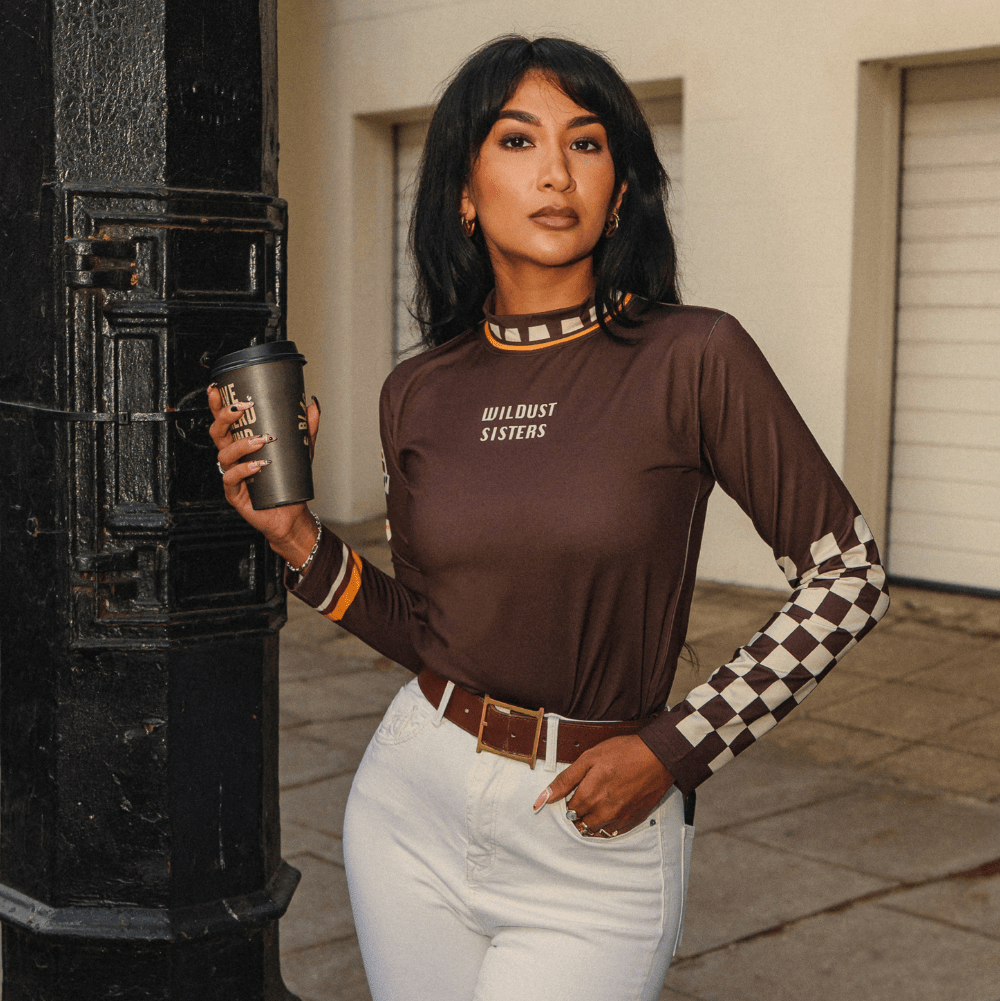 Wildust Sisters Racing Club thermal Lycra top with vintage racing graphics
