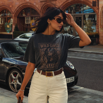 Wildust Sisters Wild Girls Club T-shirt in washed black with a beige front graphic