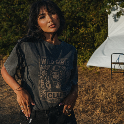Wildust Sisters Wild Girls Club T-shirt in washed black with a beige front graphic