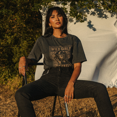 Wildust Sisters Wild Girls Club T-shirt in washed black with a beige front graphic